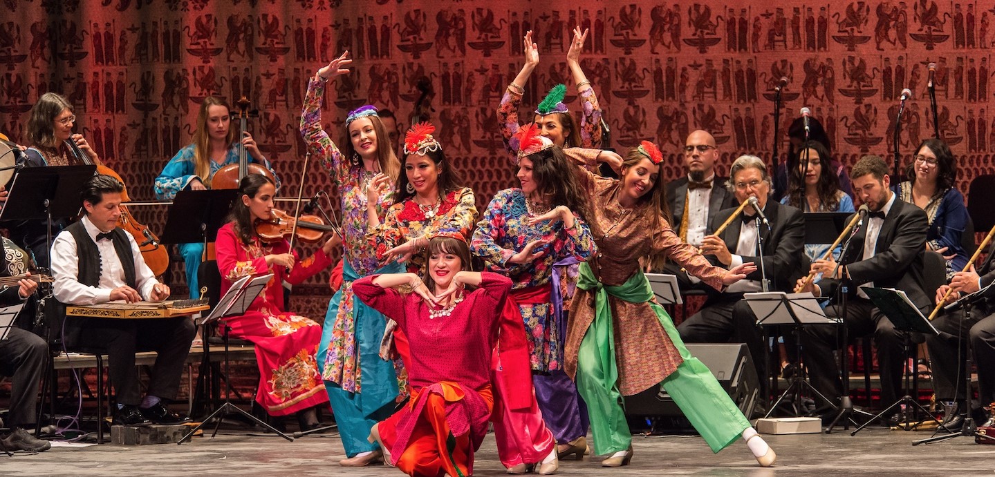 This is a photo of the UCSB Middle Eastern Ensemble which is made up for dancers and musicians.
