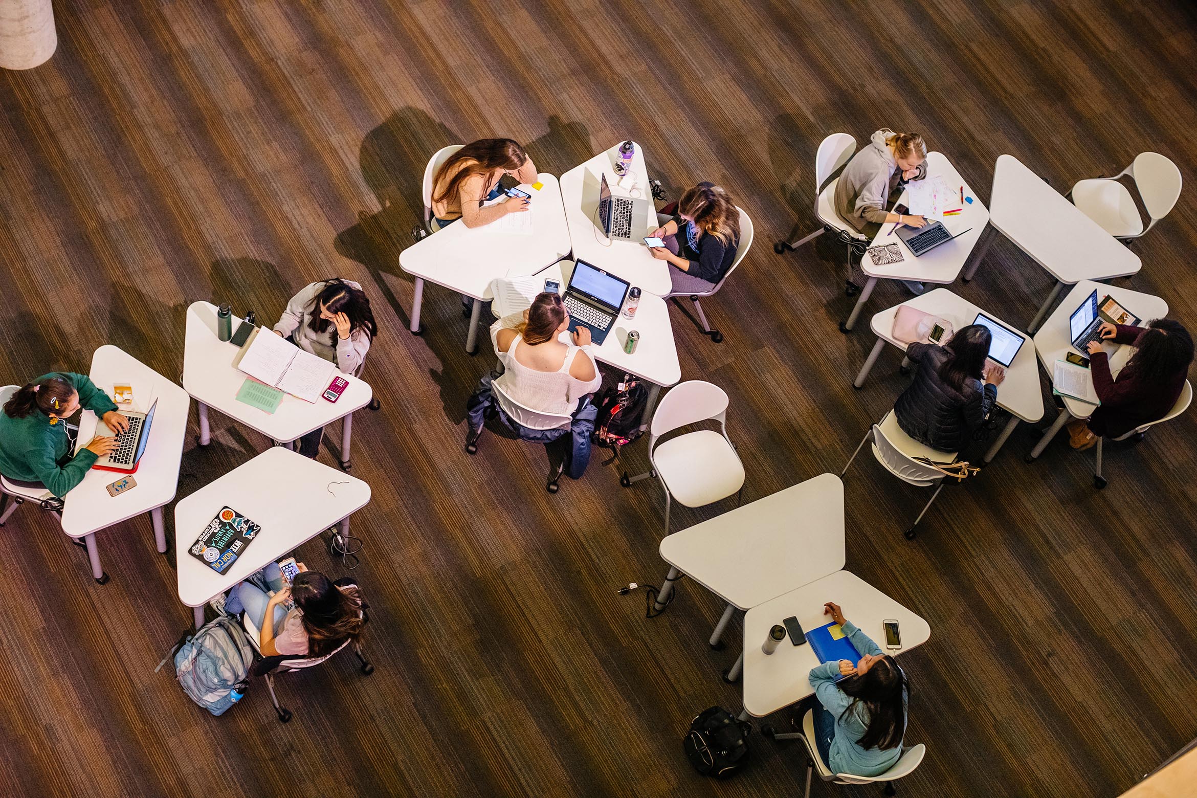 This is an image of students studying in the Student Resource Building from above.